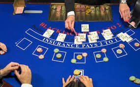 Live blackjack dealer table with prize payout information